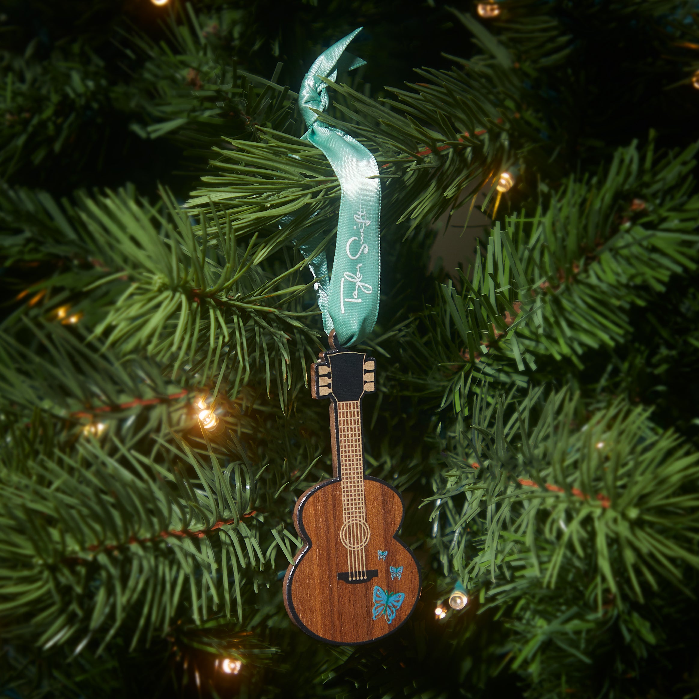 Self-Titled Butterfly Guitar Ornament on Tree